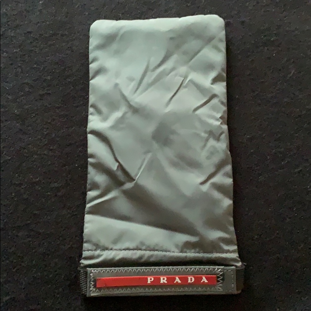 100% Authentic Prada pocket case with sport strap